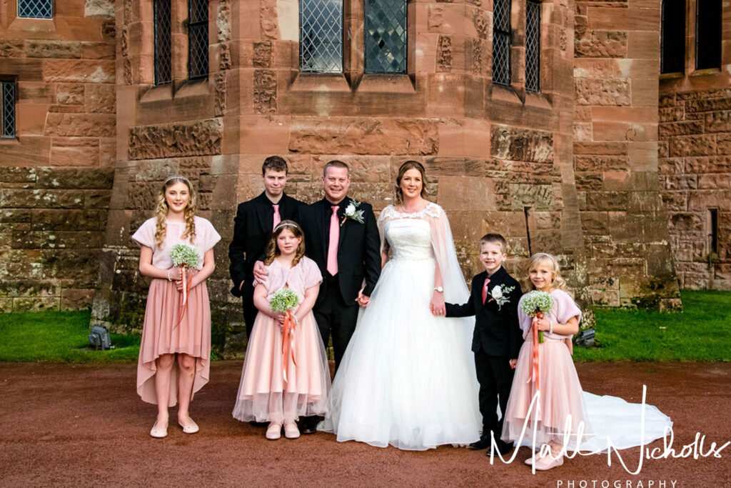 Family wedding photograph at Peckforton Castle