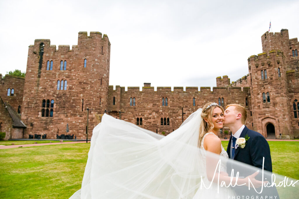 Bride and groom at their wedding at Peckforton Castle