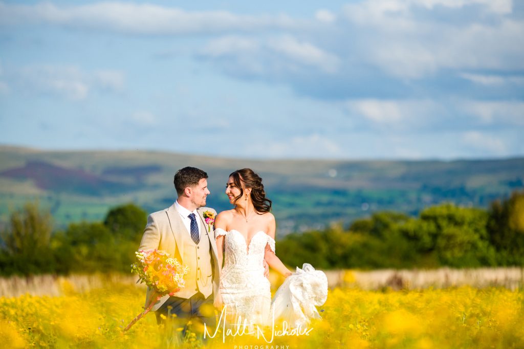 Bride and Groom on their wedding day at The Out Barn Wedding venue near Clitheroe